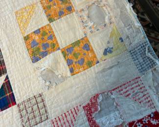 Multicolored Churn Dash Quilt