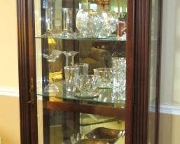 Embassy Collectors Curio Cabinet by Howard Miller