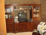 TV, cabinets and books and tapes