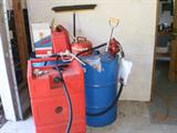 two gas storage tanks with hand pump.