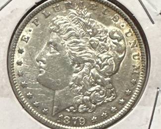 Several nice coins in this auction including this 1879 Morgan silver dollar. 