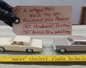 Old 1960s toy advertising premiums given out or sold by Ford motor company, this is a 1967 Thunderbird (friction) and a 1965 Galaxy