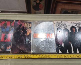 Several lots of vintage record albums in this sale, this one has KISS albums and one is autographed by band members. 