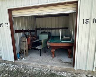 Storage unit 15 contents include pool table with beautiful carved wooden legs, cafe / restaurant seating, more. 