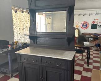 Lots of antique furniture in this sale.  This is an 1870s 1880s victorian Eastlake marble top buffet server w beveled mirror and display shelf, 2 drawers, 2 doors, storage underneath.  