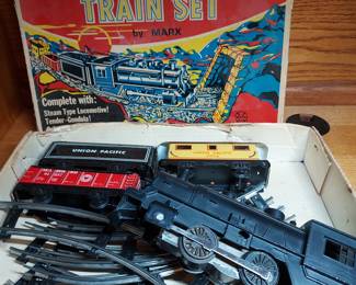 2 old toy train sets in this auction, both in the original box.  One is Tyco and the other Marx