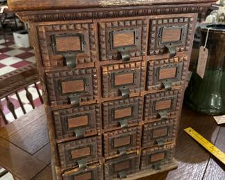 Antique carved wooden apothecary doctor or pharmacist cabinet w drawers for herbs, medicines, cures, remedies etc