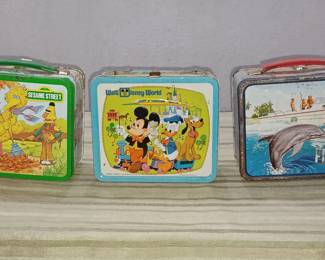 numerous lots with old tin litho lunchboxes in this sale. These are Sesame Street, Mickey Mouse / Disney, and Flipper, there are lots more such as Man from Uncle, Mork and Mindy etc.  