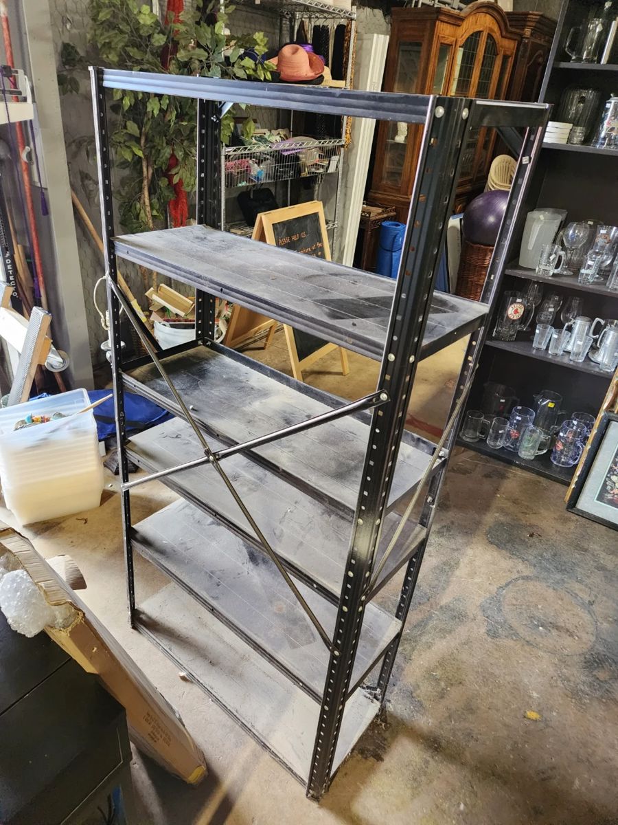 Lightweight metal garage shelf about 4.5 feet tall.

Was $25
$20 for this 4 day event.
