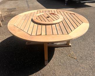 $2,800 Kingsley-Bates 60" round teak dining table with lazy-susan.
6 * KB teak chairs with teal cushions.
2 * 8' wide teal sunbrella
All structurally sound but would greatly benefit from a power-wash to restore them to their glory!