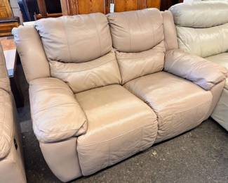 $375 Taupe leather loveseat, raise legs 64 x 40 x 36