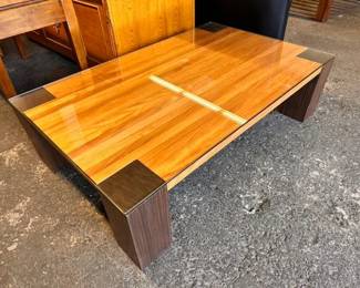 $1,300 Blackwood and Teak coffee table with glass top 63 x 40 x 16.5