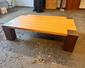 $1,300 Blackwood and Teak coffee table with glass top 63 x 40 x 16.5
