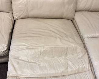 $1,200  White leather 4-piece sectional, raised foot rest 148 x 36 (chaise 63) x 40