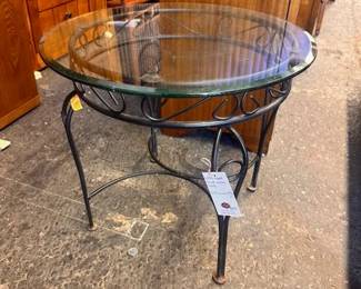 $100 glass top round metal table 21.5 round 19.75 high