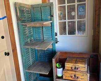 Small handmade bench with decorative suitcases