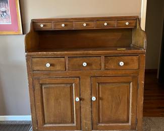 Antique cupboard with porcelain knobs- from a hotel- paperwork inside