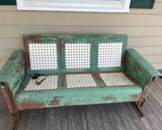 Glider painted green