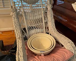 White wicker rocker and large vintage McCoy pots