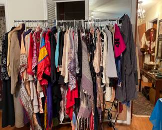 Tons of ladies clothes, cashmere sweaters, scarves, etc