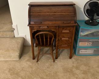 Adorable child’s roll top desk.