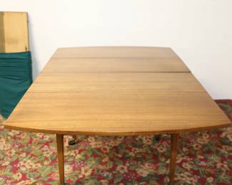 American of Martinsville walnut MCM drop leaf table with 3 leaves