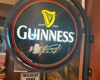 Guinness double-sided hanging light.