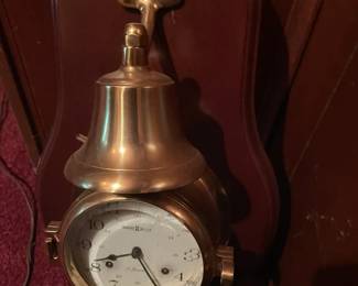 Howard Miller wall clock 613-463 brass ship style with ball-free ship.