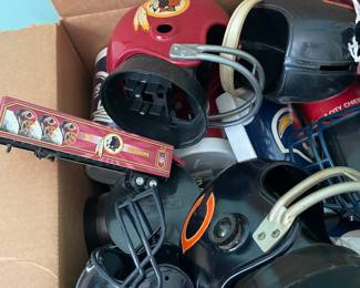 NFL Team football helmets.