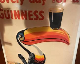"Lovely Day for a Guinness" beer sign.