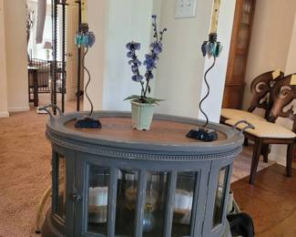 Cute Oval Tea Table With Removable Tray And Glass Doors, Plus Decor Items Contents.