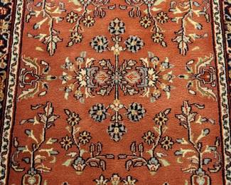 Sarouk runner carpet 12' x 2'8" in vwrmillon orange red purchased from Oriental Rugmart from the Williamsburg Pottery in 2004