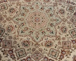 Persian Tabriz 9' x 12' is cream, tans, and greens, purchased at the Rugmart at the Williamsburg Pottery Factory, in the Formal Living Room 