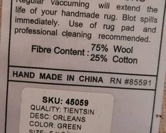 Carved wool rug 5' x 7'