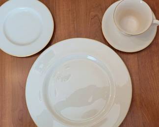 Lenox Eternal with gold band.  Includes 16 dinner plates, 16 each cups and saucers, 16 bread plates.  Sold as a 48 piece set. (Note that the salad plates and dessert bowls are sold separately.)
