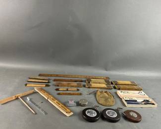 Lot 398 | Wooden Measuring Sticks, Tape Measures & More
