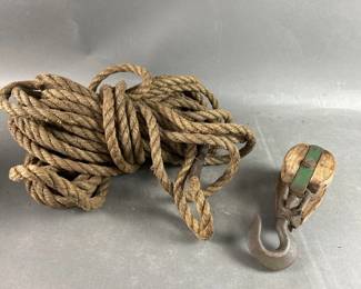 Lot 219 | Vintage Rope And Metal Wood Pulley
