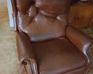 A Brown Leather Like Easy Chair, 