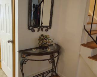 A Wall Mirror and A Demi-Lune Table, 