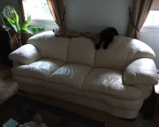 A Full Sized Real Leather White / Ivory Sofa, very Comfortable, 
