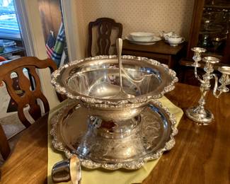 large punch bowl with cups