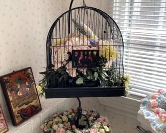 metal bird cage on stand
