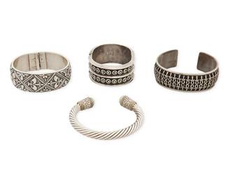 2192
A Group Of Silver Bracelets
Late 20th/21st century
Two marked for maker and sterling; one marked to edge with illegible mark
Four works comprising a Deborah Armstrong "Fleur de Lis" sterling silver bangle bracelet, a silver metal cuff with ankh cross motif overlay banding, as well as a Pedro Perez/Rancho Alegre Mexican sterling silver hinged cuff bracelet, and a silver metal twisted cable wire bracelet, with faux pearl end stoppers, 4 pieces
Largest: 7.75" inner C x 1" H; smallest: 6.75" inner C x 1.125" H
241. 4 grams gross
Estimate: $500 - $700