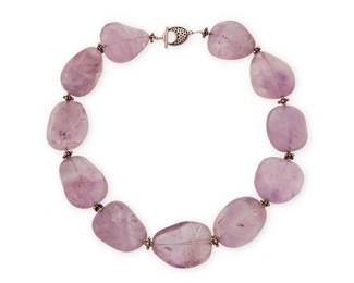 2082
A Chunky Sterling Silver And Amethyst Necklace
Stamped to clasp: 925 / [maker's mark]
With chunky tumbled amethyst stones and sterling silver bead spacers
19.5" L x 1.25" H
327.7 grams gross
Estimate: $200 - $300