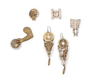 2045
A Group Of Studio Design Sterling Silver And Mixed Metal Earrings
Late 20th/21st century
Each marked for artist and for sterling
Three works comprising a pair of Linda Hesh sterling silver asymmetrical designed earrings with one depicting a mask between pillars and the other a seated figure reading a newspaper, as well as a second pair by Linda Hesh in sterling silver, bronze and set agate, one designed as long gorilla arm and the other a gorilla hand holding the stone, together with a pair of Susan Silver Brown "Feathered Fetish" earrings with applied lizards and Chinese coins, 6 pieces
Largest: 4" H x 1.125" W; smallest: 1" H x 1" W
71.0 grams gross
Estimate: $400 - $600