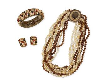 2162
A Group Of Beaded Jewelry
Late 20th/21st century
One marked for maker; two marked for sterling
Three works comprising a Celia Sebiri multistrand torsade necklace with citrine and set smoky topaz sterling silver clasp, together with an unmarked Michal Michaud for Silver Seasons sterling silver hinged bangle bracelet with attached stone beads and a pair of matching earrings, 4 pieces
Torsade: 18" L x 1.75" H; bangle: 6.5" inner C x 0.875 "H; each earring: 1" H
222.2 grams gross
Estimate: $400 - $600