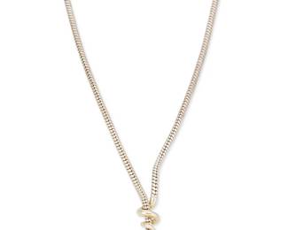 2128
A DVA Silver And Sapphire Snake Lariat Necklace
Late 20th/21st century
Marked for artist
A sterling silver lariat snake with gem-set orange sapphire eyes and vermeil tail
17" L approximately
49.1 grams gross
Estimate: $500 - $700