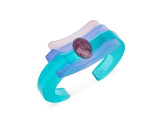 2073
A Vintage French Resin Cuff Bracelet
Mid-20th century
Unmarked
With multicolored resin layers and a central set fluorite cabochon
6.125" total inner C x 1.125" H, with a 1.125" gap
Estimate: $200 - $400