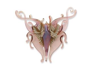 2141
A Vintage Polish Handblown Glass Brooch
Late 20th century
Unmarked
An intricate handblown purple glass fanciful "bizarre" floral motif brooch with clay details
2.75" H x 3.125" W
Estimate: $300 - $500