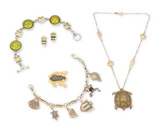 2212
A Group Of Jewelry
Late 20th century
Four marked for maker; three further marked for sterling; one unmarked
Five works comprising a Judith Jack sterling silver stone set frog brooch, a vintage signed sterling silver sea animal charm bracelet, a Misis stone-set turtle pendant on a vermeil chain, and a green glass and set stone link bracelet, as well as a pair of Lagos Caviar sterling silver and 18K gem-set earrings, 6 pieces
Necklace: 17" L x 1.5" H; bracelets: 8.75" L and 8" L; brooch: 1.25" H; each earring: 0.75" H
129.0 grams gross
Estimate: $500 - $700